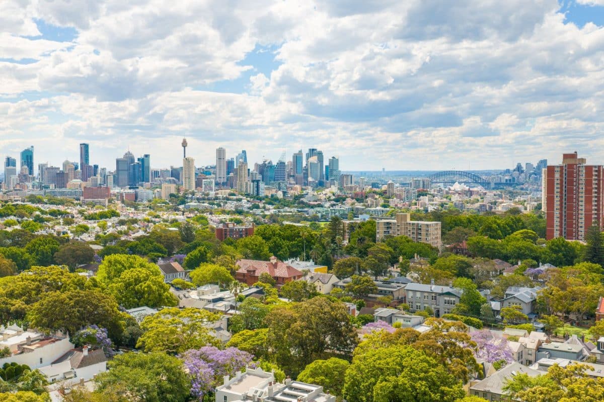 Global investor comparing U.S. real estate opportunities against property markets in London, Dubai, Singapore, and Sydney in 2026